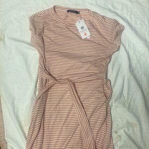 Soft & stretch form fitting woman’s dress.